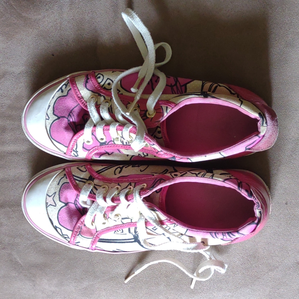Coach Poppy woman's lace up shoes.